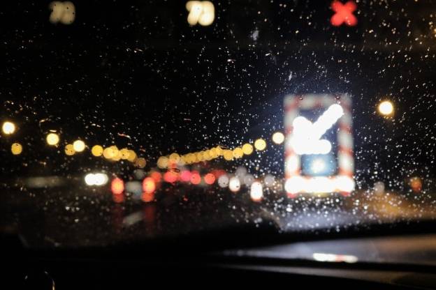 Raindrops on a car windshield