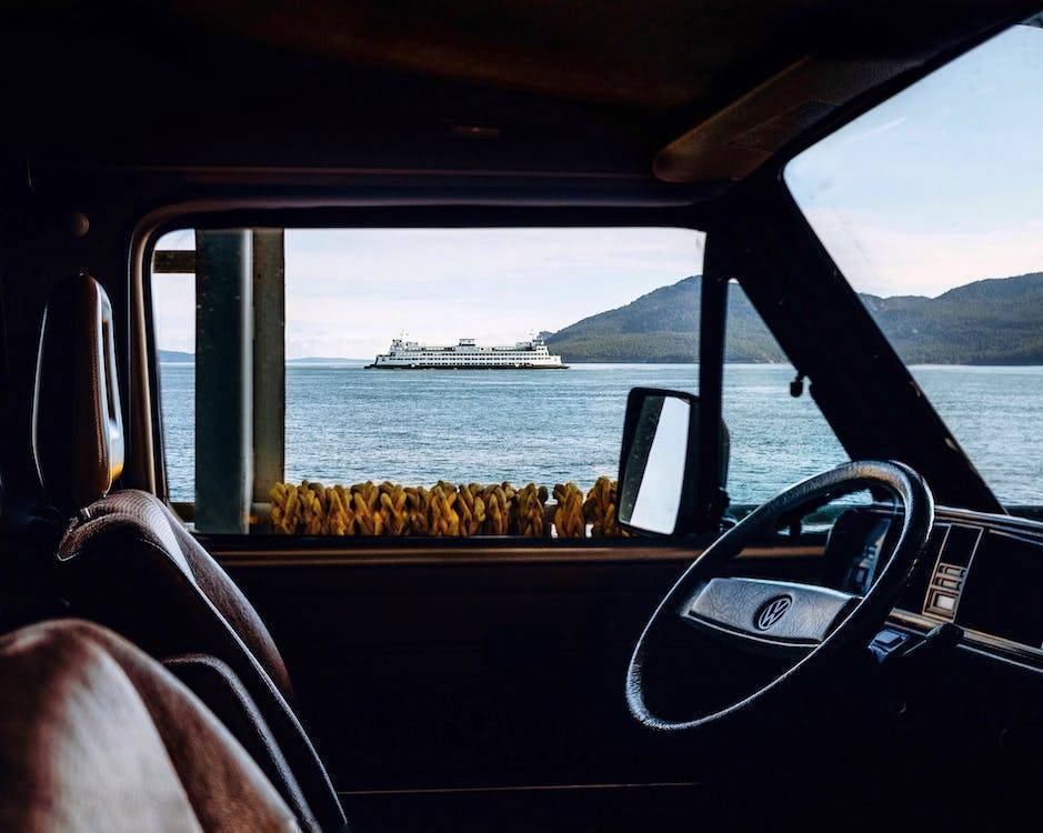 A car window showing the ocean